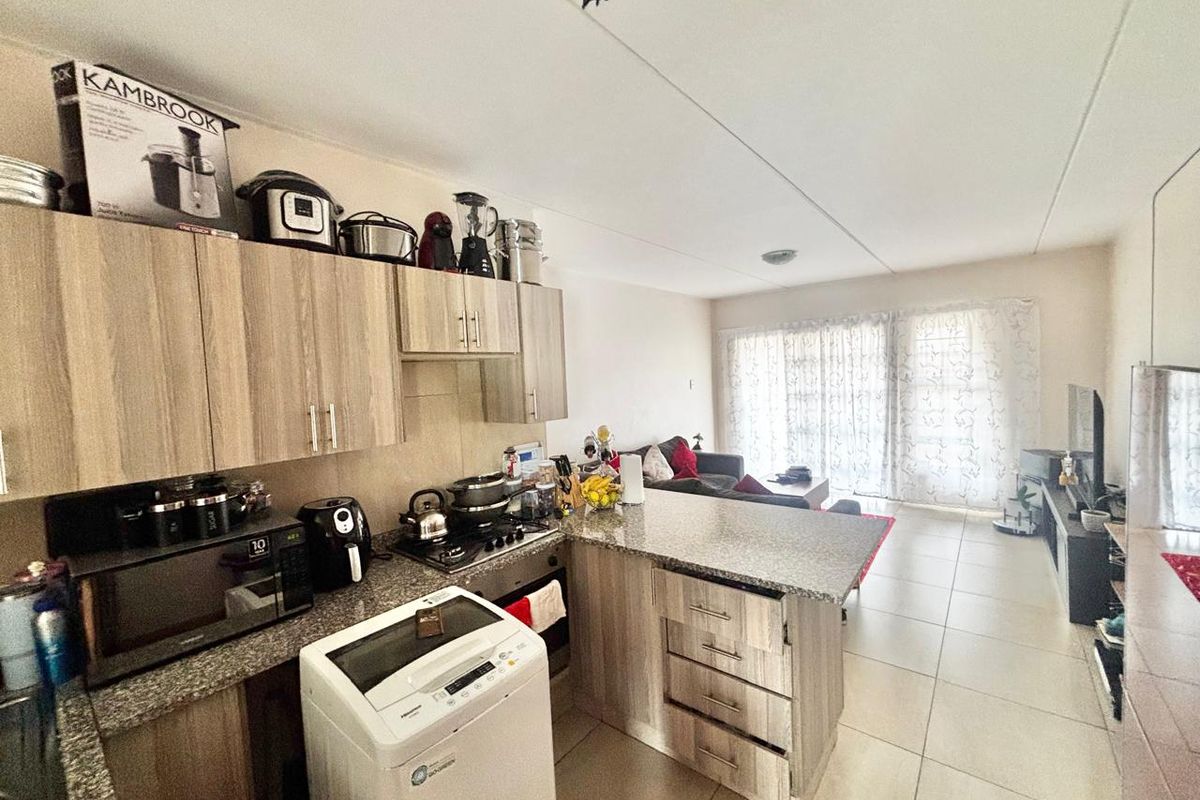 Modern Lock-Up-and-Go Living with Private Braai - Photo 2