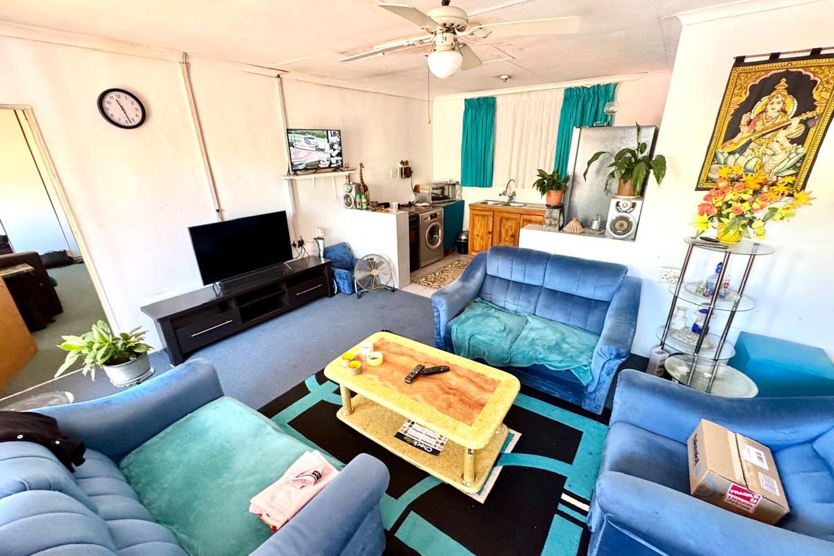Warm Family Home with Granny Flat, Lush Gardens and Versatile Living Spaces - Photo 2