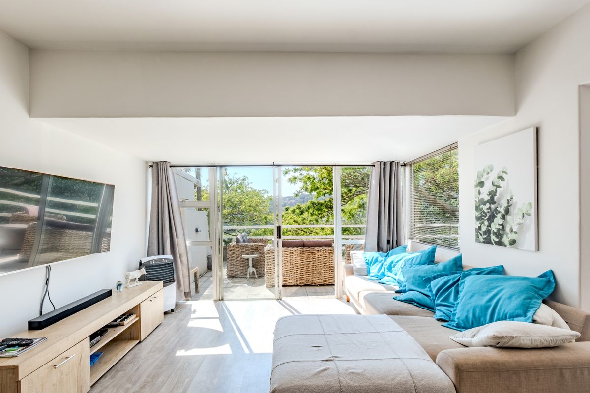 Secure, Spacious and Full of Sunshine! - Photo 2