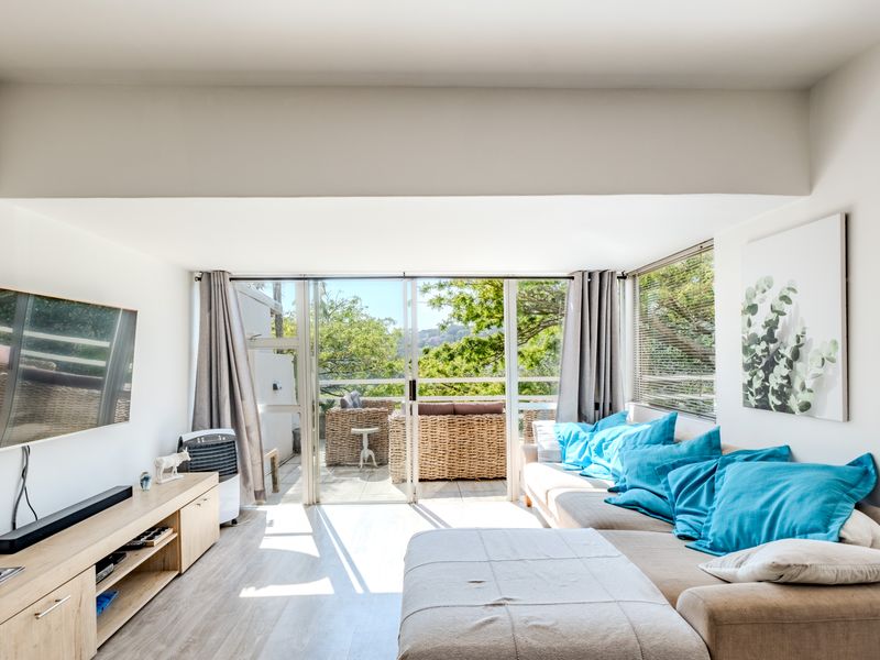 Secure, Spacious and Full of Sunshine! - Photo 2