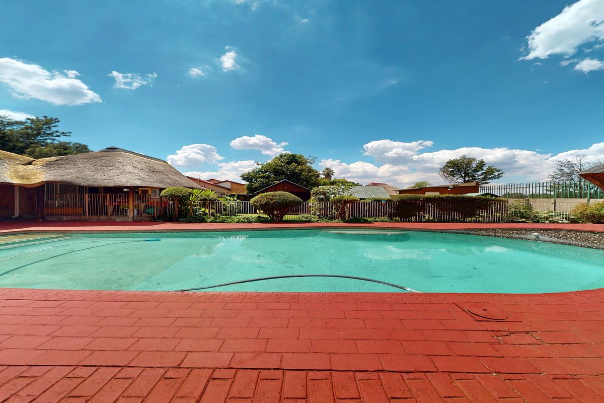 Spacious 4-Bedroom Family Home with Flatlet, Pool  and Excellent Security - Photo 4