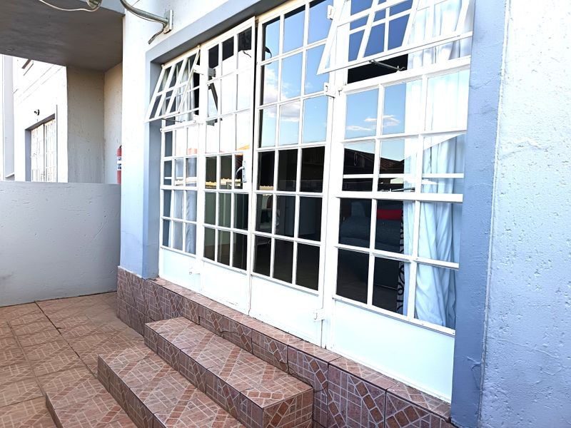 Modern Comfort Meets Secure Estate Living - Photo 2