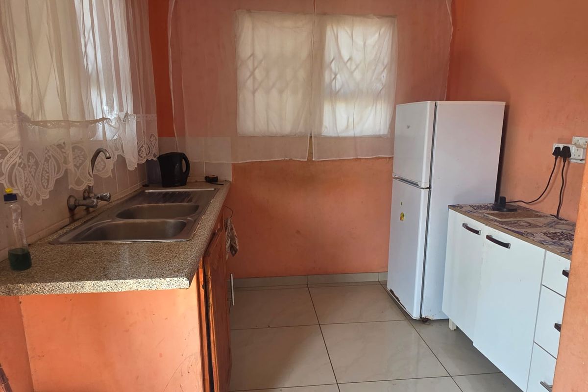 Investment Opportunity – 3-Bedroom Home with Large Yard - Photo 2