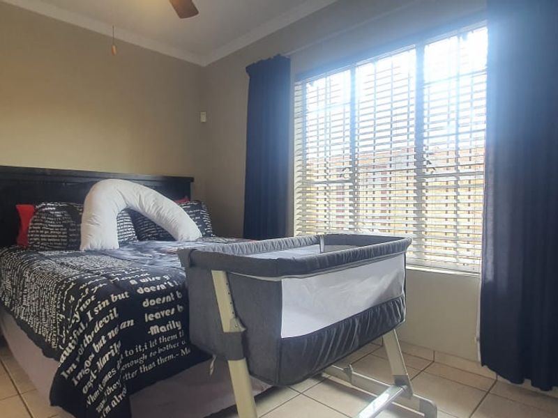 Modern & Secure 3-Bedroom Home in Sought-After Estate - Photo 8