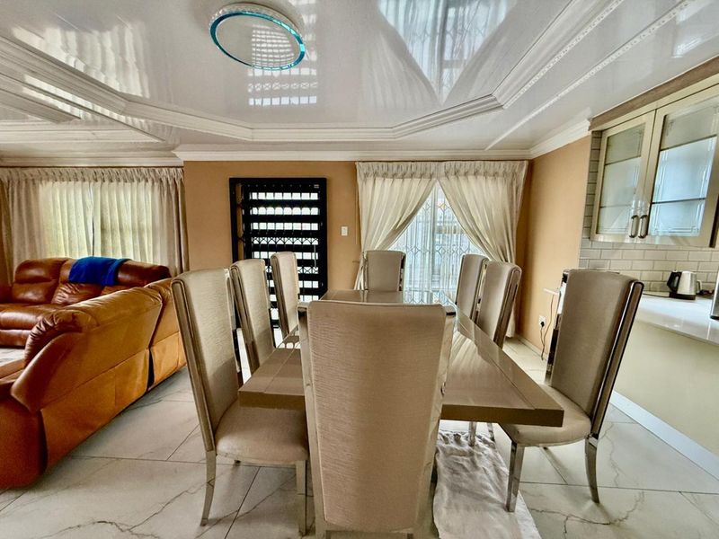 Beautiful Three-Bedroom Family Home in Chantelle with Self-Contained Cottage - Photo 6