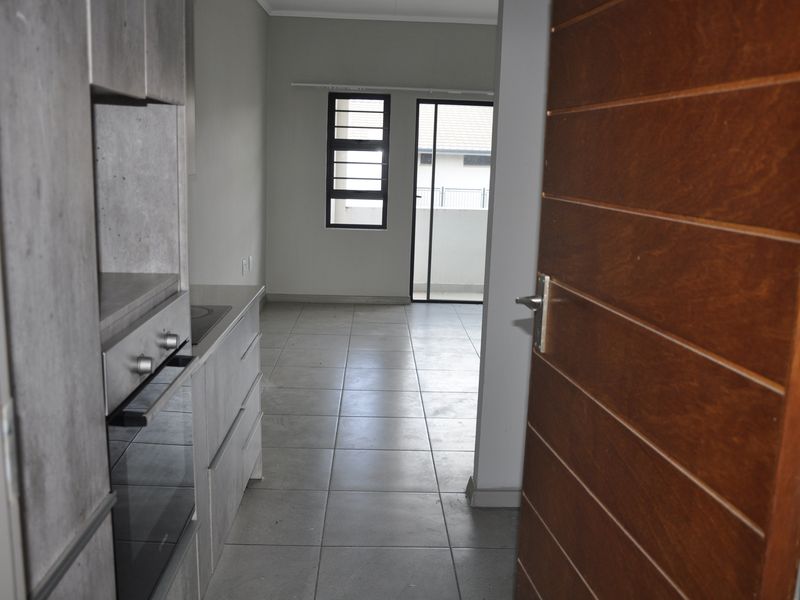 Modern Living Meets Prime Location in Amberfield City - Photo 2