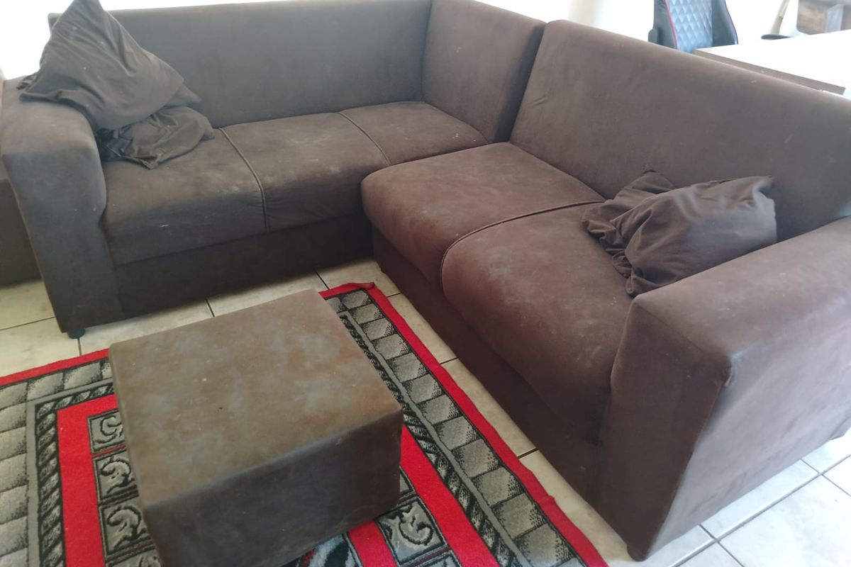 A living room area featuring tiled flooring.