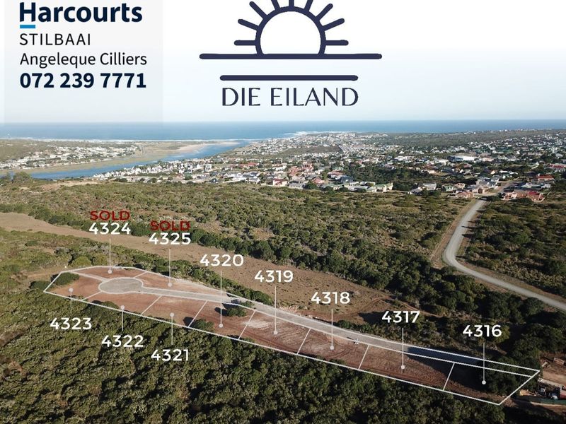 Aerial view of vacant residential plots in Die Eiland estate, showcasing the coastal landscape and surrounding infrastructure.
