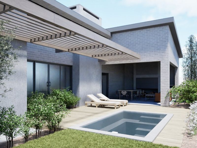 Modern outdoor entertainment area featuring a swimming pool, timber decking, covered pergola, and a built-in braai area.