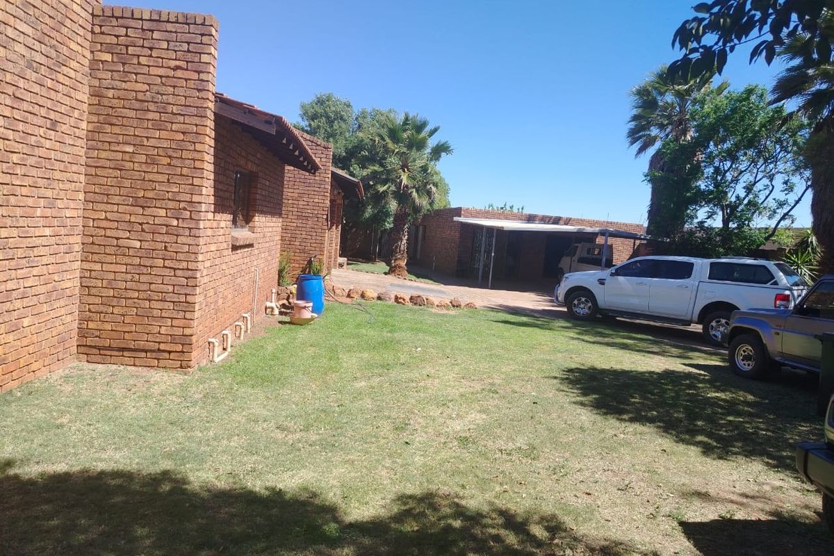 Huge plot and  home,  outbuildings, running business venue with income , endless options. BARGAIN. - Photo 2