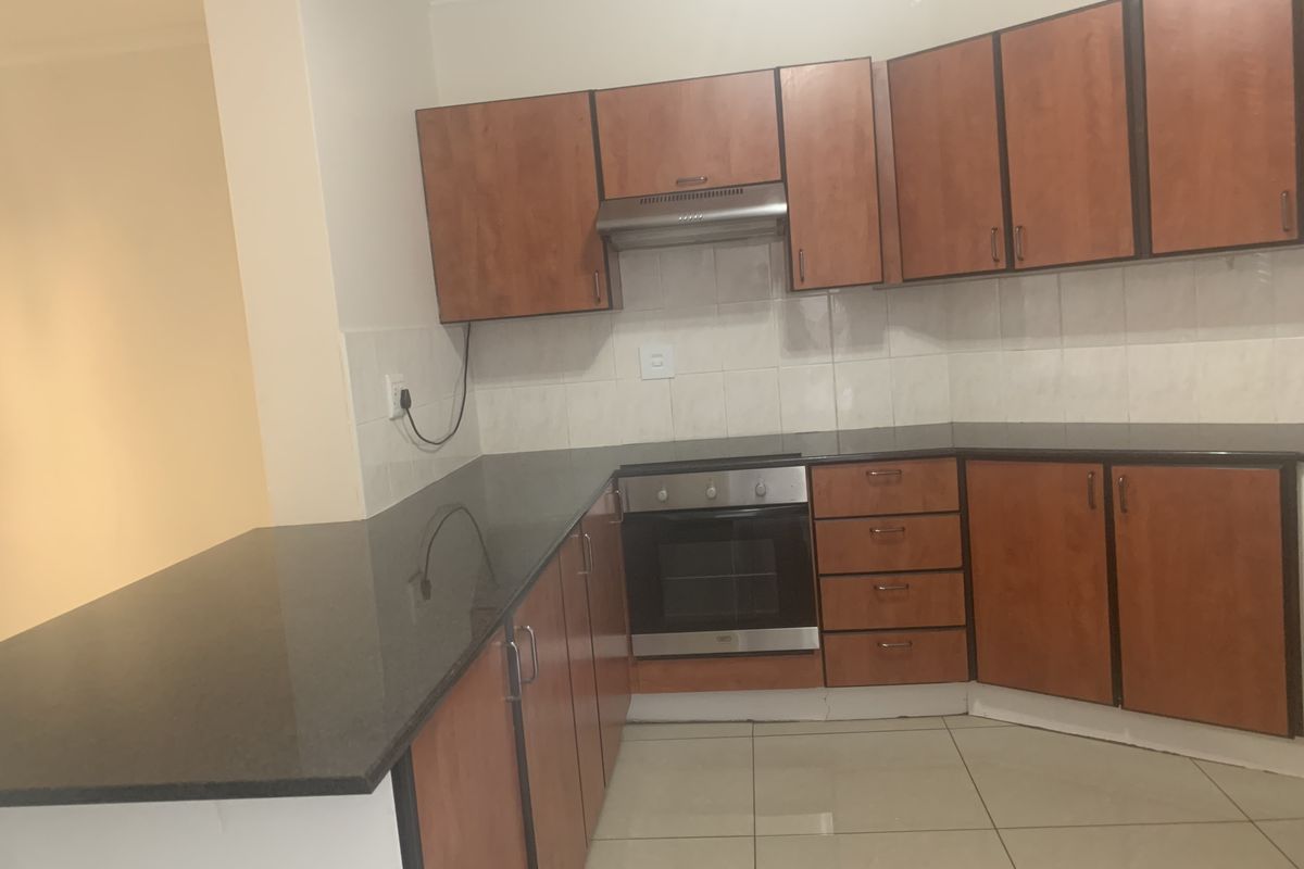 Stylish 2-Bedroom Home with Dual En-Suites  Millennium Village, Halfway Gardens - Photo 4