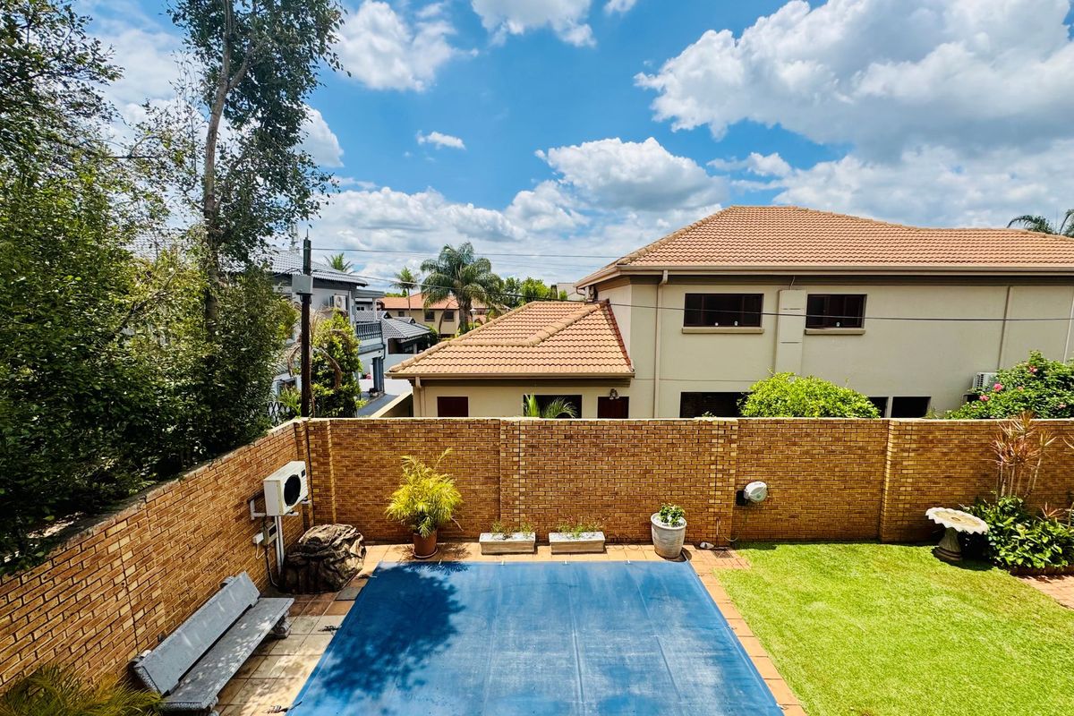 Flawlessly Maintained 4-Bedroom Estate Home with Private Garden and Pool - Photo 4