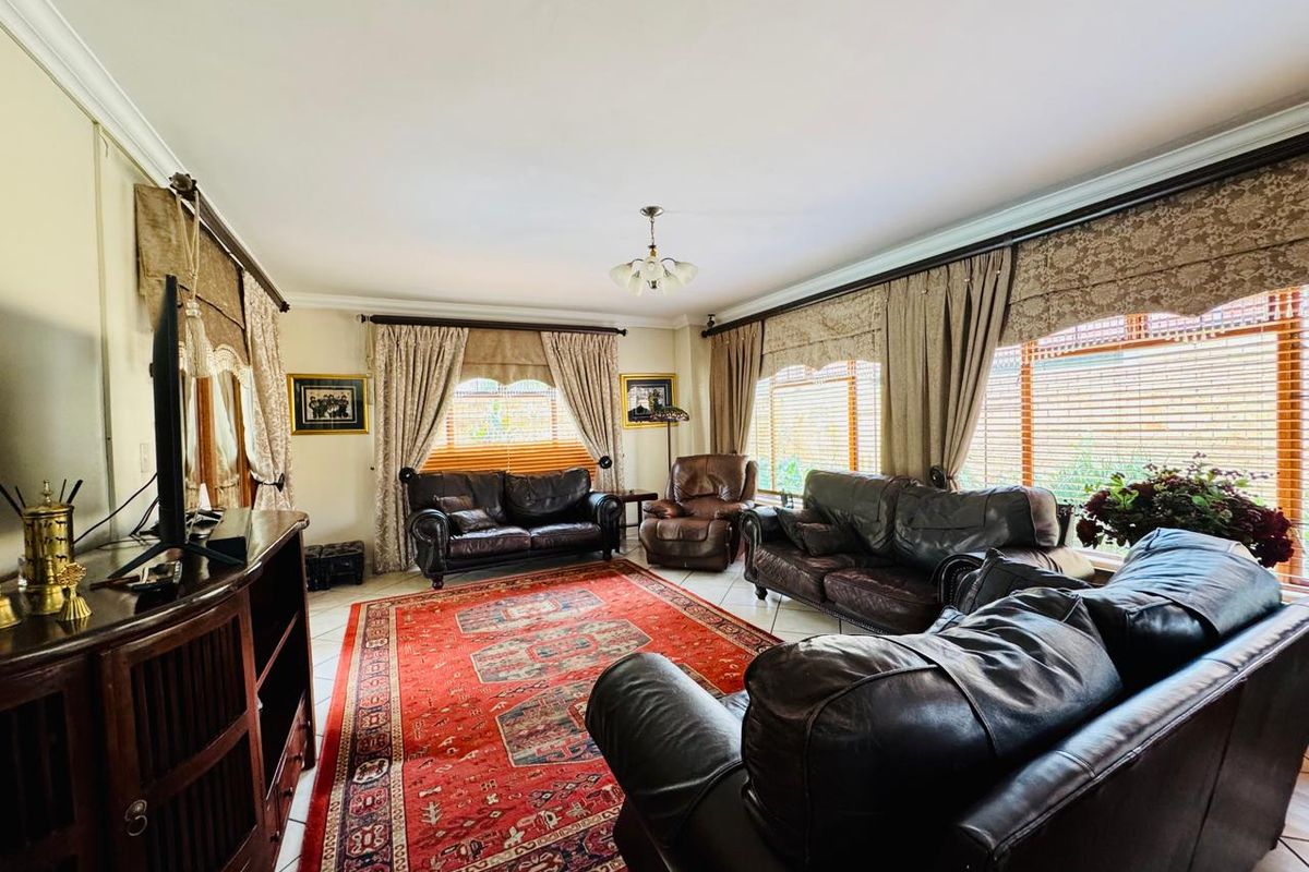 Flawlessly Maintained 4-Bedroom Estate Home with Private Garden and Pool - Photo 3