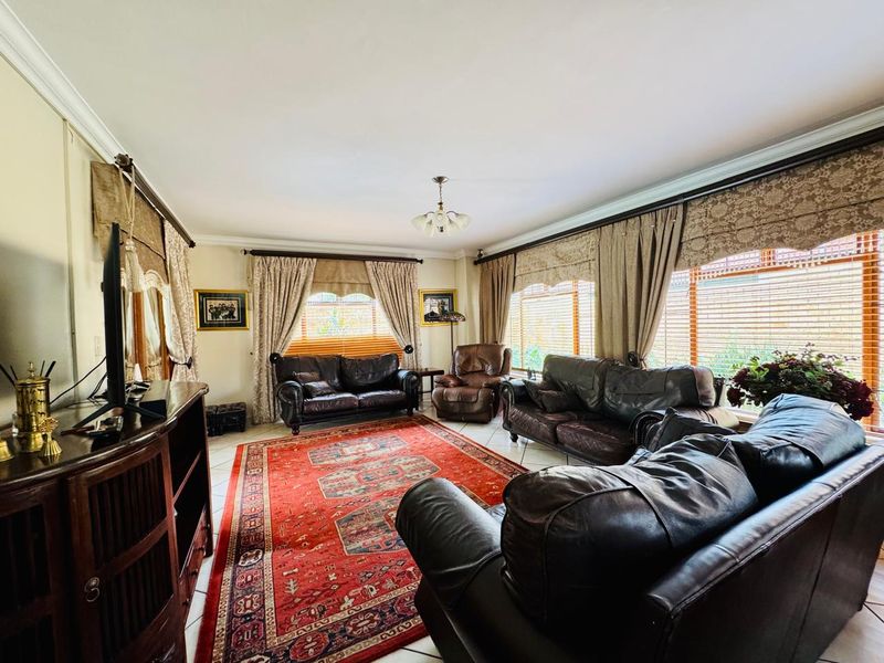 Flawlessly Maintained 4-Bedroom Estate Home with Private Garden and Pool - Photo 3