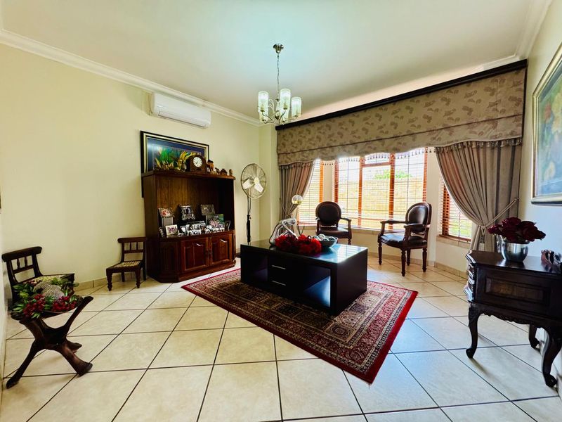 Flawlessly Maintained 4-Bedroom Estate Home with Private Garden and Pool - Photo 8