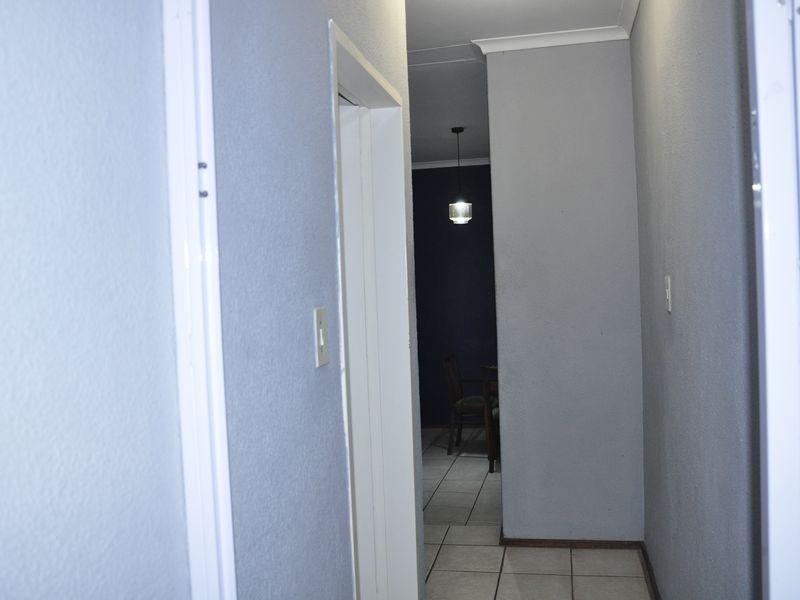 Cozy Full-Title Gem with Spacious Garden in the Heart of Halfway Gardens - Photo 10