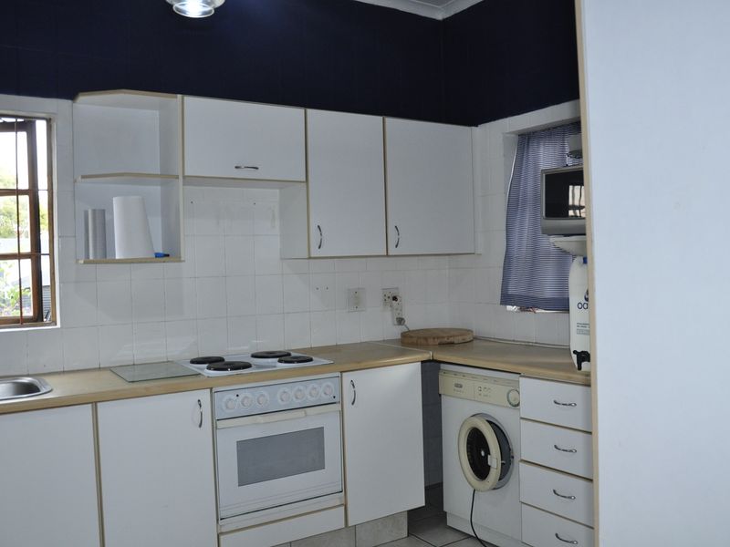 Cozy Full-Title Gem with Spacious Garden in the Heart of Halfway Gardens - Photo 9