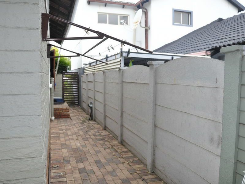 Cozy Full-Title Gem with Spacious Garden in the Heart of Halfway Gardens - Photo 8