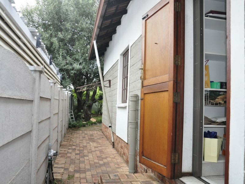 Cozy Full-Title Gem with Spacious Garden in the Heart of Halfway Gardens - Photo 7