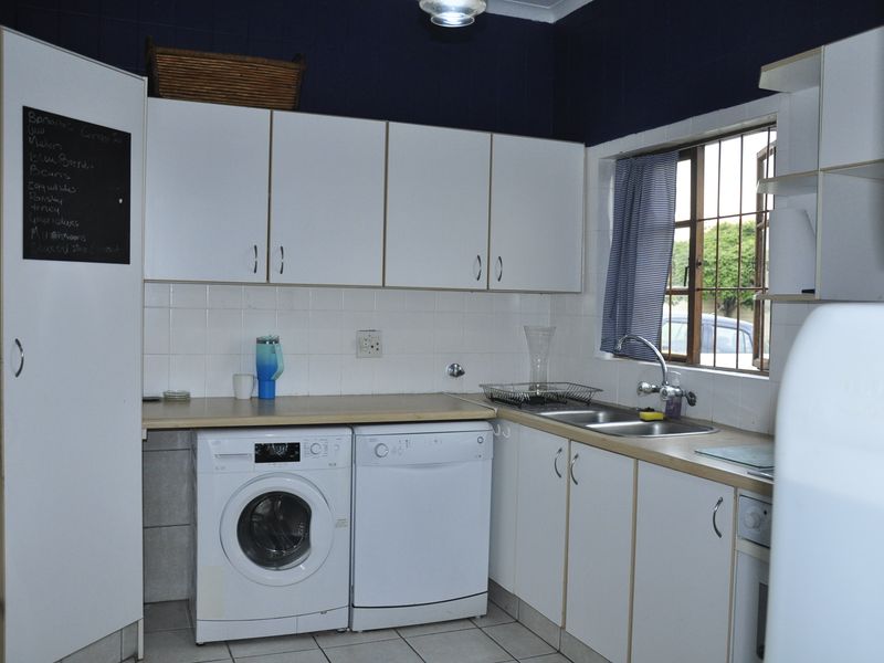 Cozy Full-Title Gem with Spacious Garden in the Heart of Halfway Gardens - Photo 6