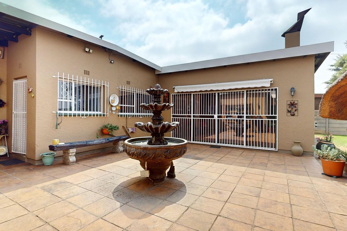 Spacious 4-Bedroom Family Home with Flatlet and  Excellent Security in Parkrand - Photo 3
