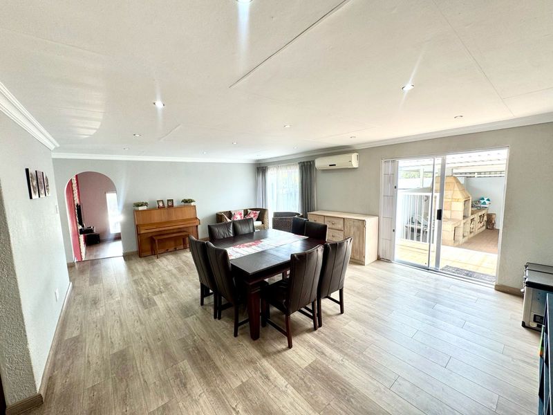 Immaculate Entertainer’s Dream with Heated Pool, Income-Generating Flat & Four Garages - Photo 8