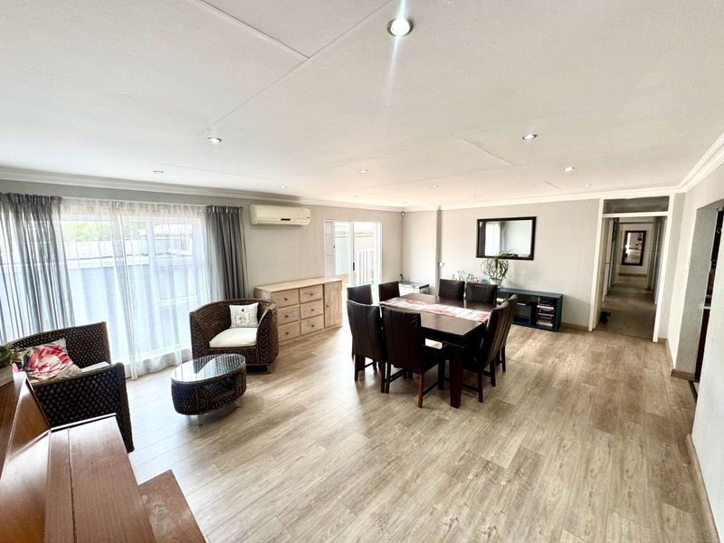 Immaculate Entertainer’s Dream with Heated Pool, Income-Generating Flat & Four Garages - Photo 7