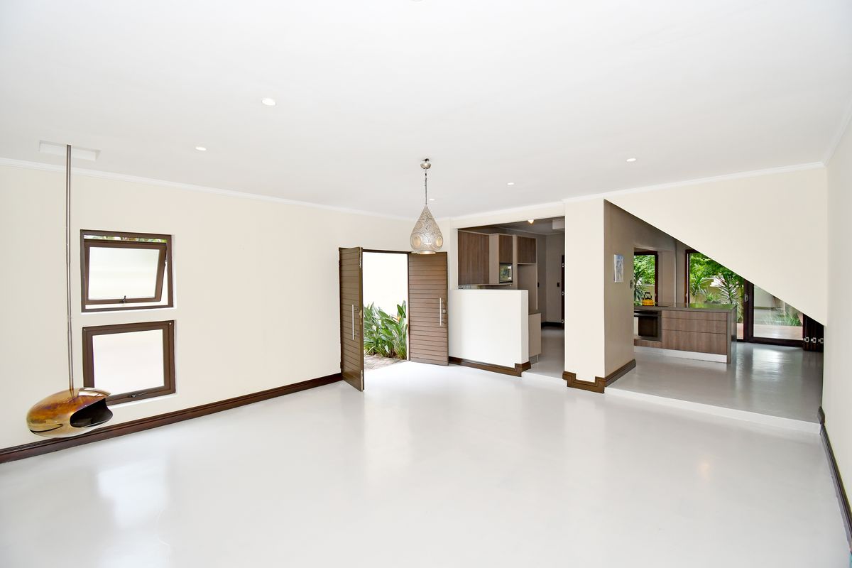 Spacious 3-bedroom home with a flexible bonus room, pool, and multiple entertainment areas. - Photo 2