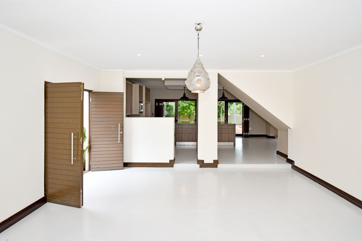 Spacious 3-bedroom home with a flexible bonus room, pool, and multiple entertainment areas. - Photo 3