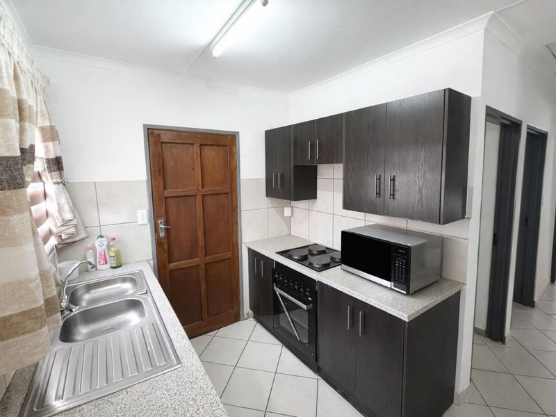 Secure Family Living in a 24-Hour Guarded Complex with Private Garden and  Park Access - Photo 3