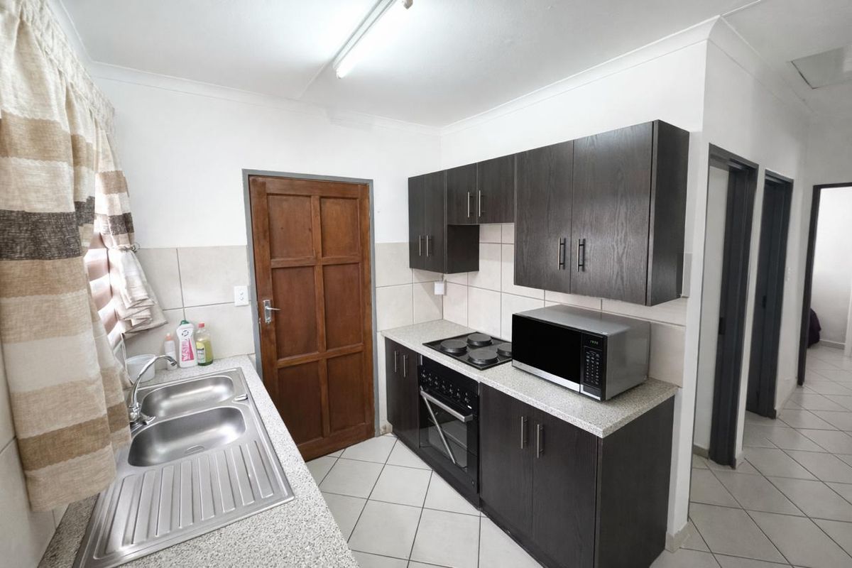 Secure Family Living in a 24-Hour Guarded Complex with Private Garden and  Park Access - Photo 3