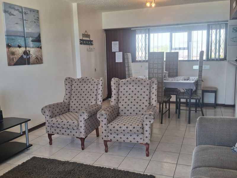 Furnished Coastal Gem with Breathtaking Ocean Views - Photo 5