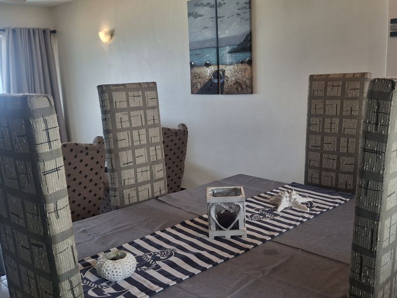 Furnished Coastal Gem with Breathtaking Ocean Views - Photo 7