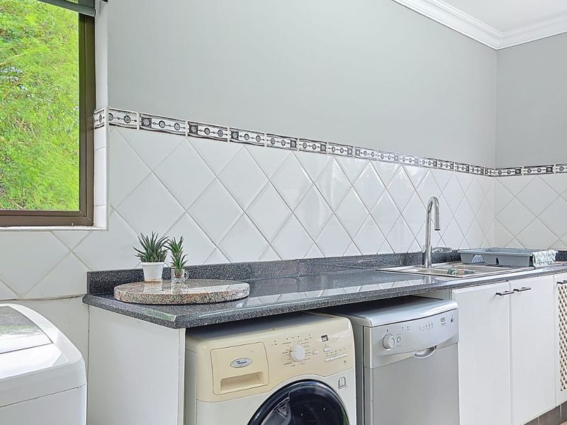 Elegant Coastal Living with Income-Generating Flatlet in Prime Ballito Location - Photo 9