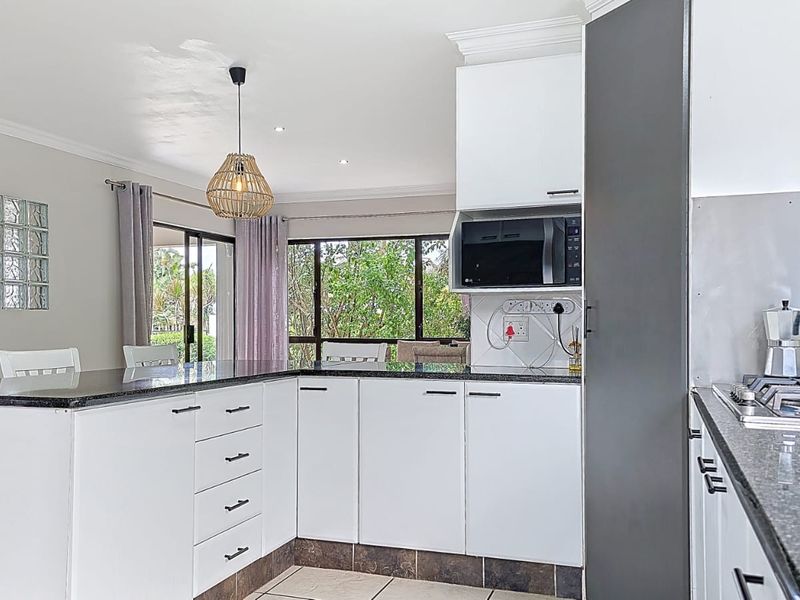 Elegant Coastal Living with Income-Generating Flatlet in Prime Ballito Location - Photo 7