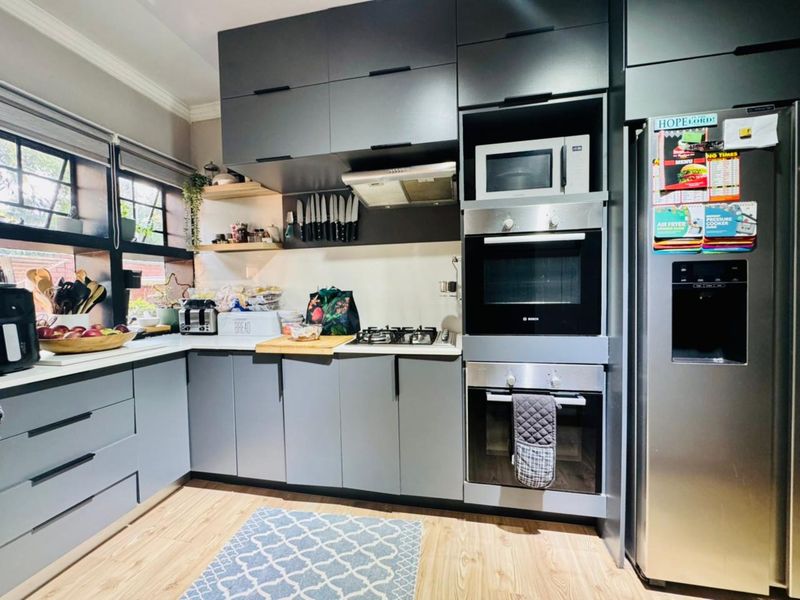 Modern Family Home with Two Income-Generating Flatlets & Full Solar System - Photo 4