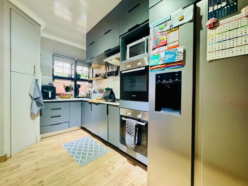 Modern Family Home with Two Income-Generating Flatlets & Full Solar System - Photo 3