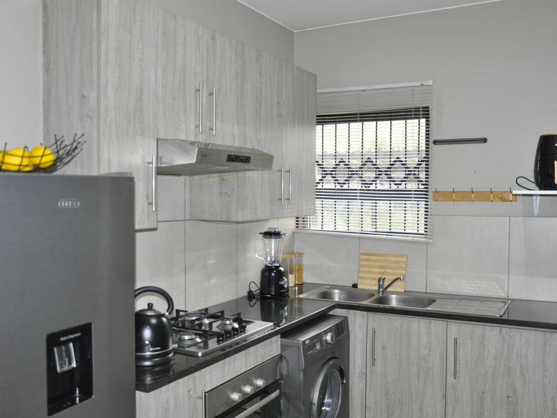A 1-bedroom ground-floor apartment is currently available at Glen Acres Park Estate in Midrand - Photo 2