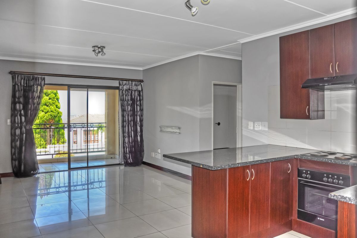 2-Bedroom Apartment with Balcony in a Quiet Suburb - Photo 2