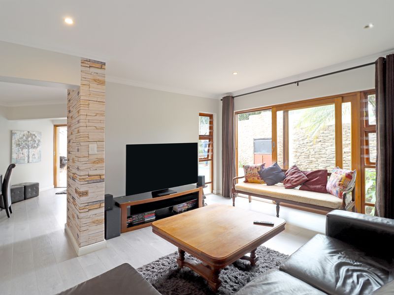 Private sanctuary in secure enclave of four homes, offering space and seamless indoor-outdoor living - Photo 6