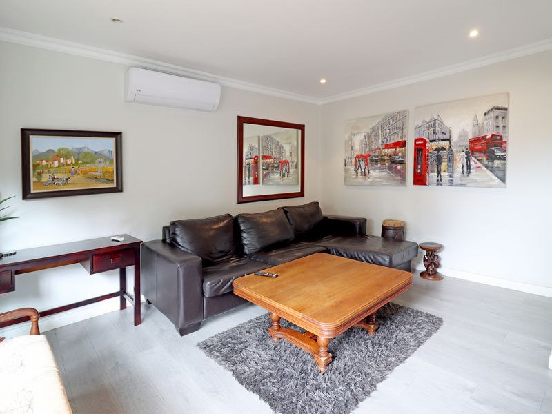 Private sanctuary in secure enclave of four homes, offering space and seamless indoor-outdoor living - Photo 7