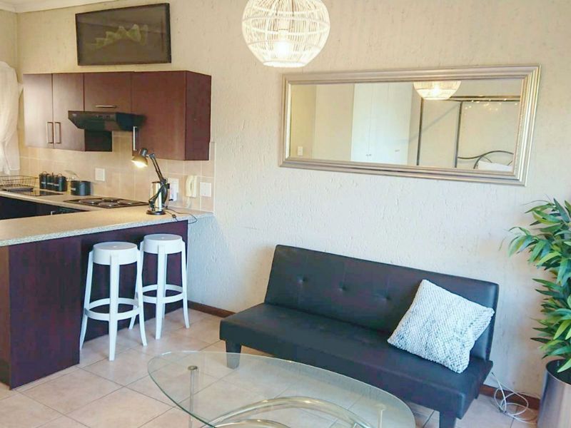 Bright and Neat Top-Floor Studio in Secure, Well-Run Complex - Photo 7