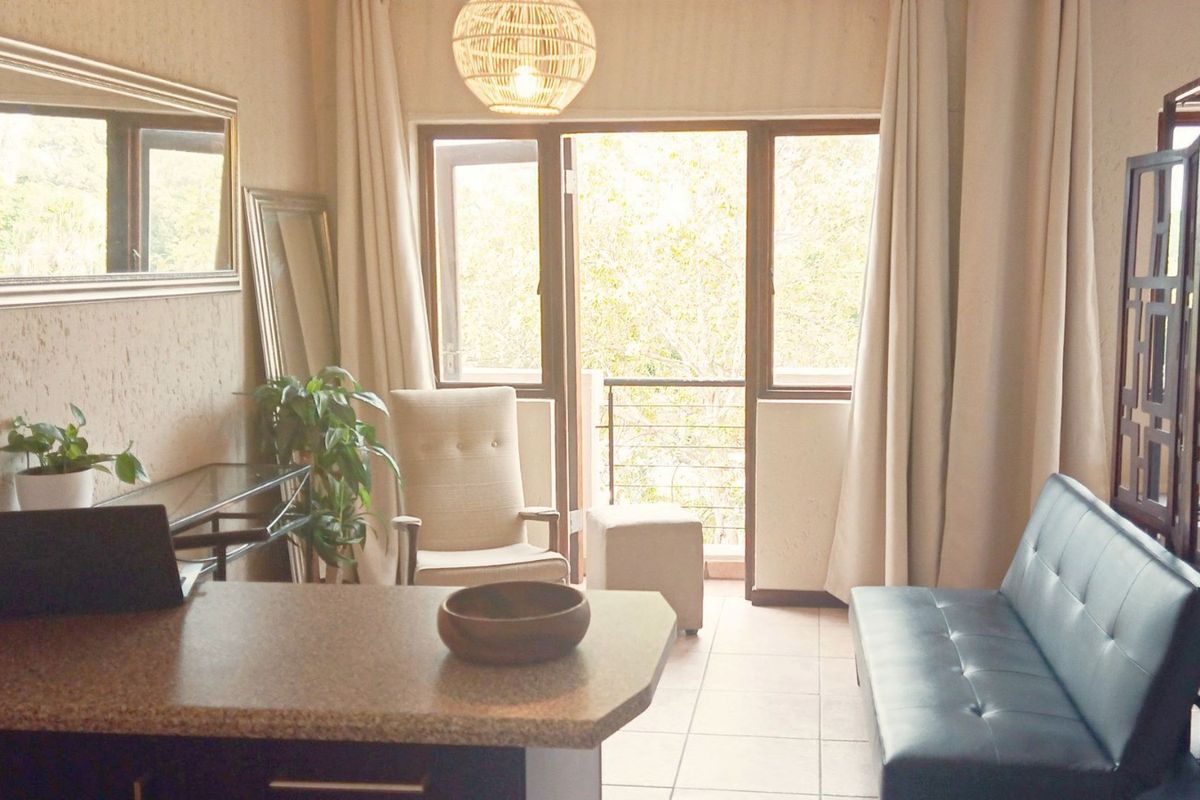 Bright and Neat Top-Floor Studio in Secure, Well-Run Complex - Photo 4