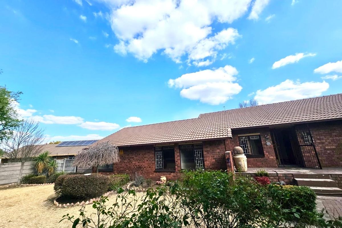 Strong, Spacious Family Home with Lapa, Braai and double garages for sale in Secunda - Photo 2