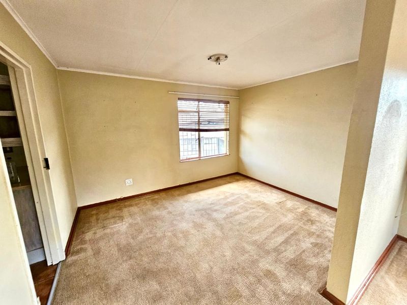 Strong, Spacious Family Home with Lapa, Braai and double garages for sale in Secunda - Photo 7
