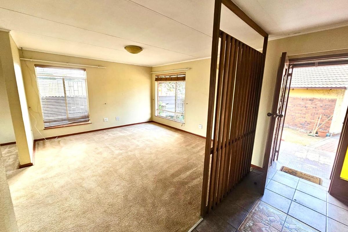 Strong, Spacious Family Home with Lapa, Braai and double garages for sale in Secunda - Photo 4