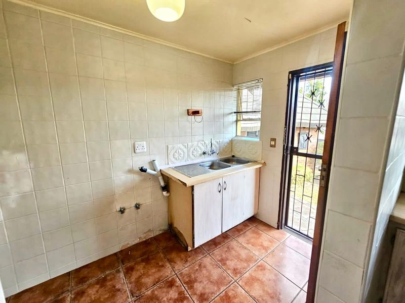 Strong, Spacious Family Home with Lapa, Braai and double garages for sale in Secunda - Photo 10