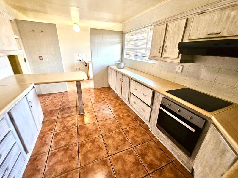 Strong, Spacious Family Home with Lapa, Braai and double garages for sale in Secunda - Photo 9