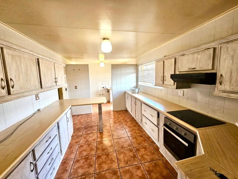 Strong, Spacious Family Home with Lapa, Braai and double garages for sale in Secunda - Photo 8