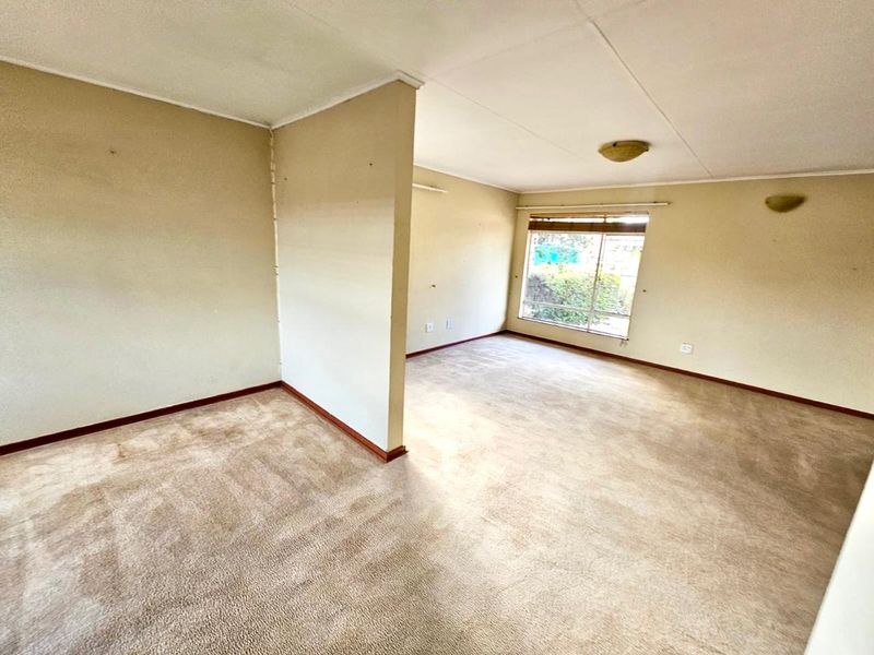 Strong, Spacious Family Home with Lapa, Braai and double garages for sale in Secunda - Photo 5